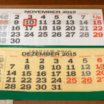 Closeup of a calender showing the months of November and December 2015
