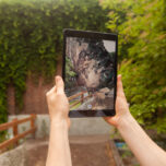 An AR Image on a tablet, adding to the scene in front of it a big shimmery object.